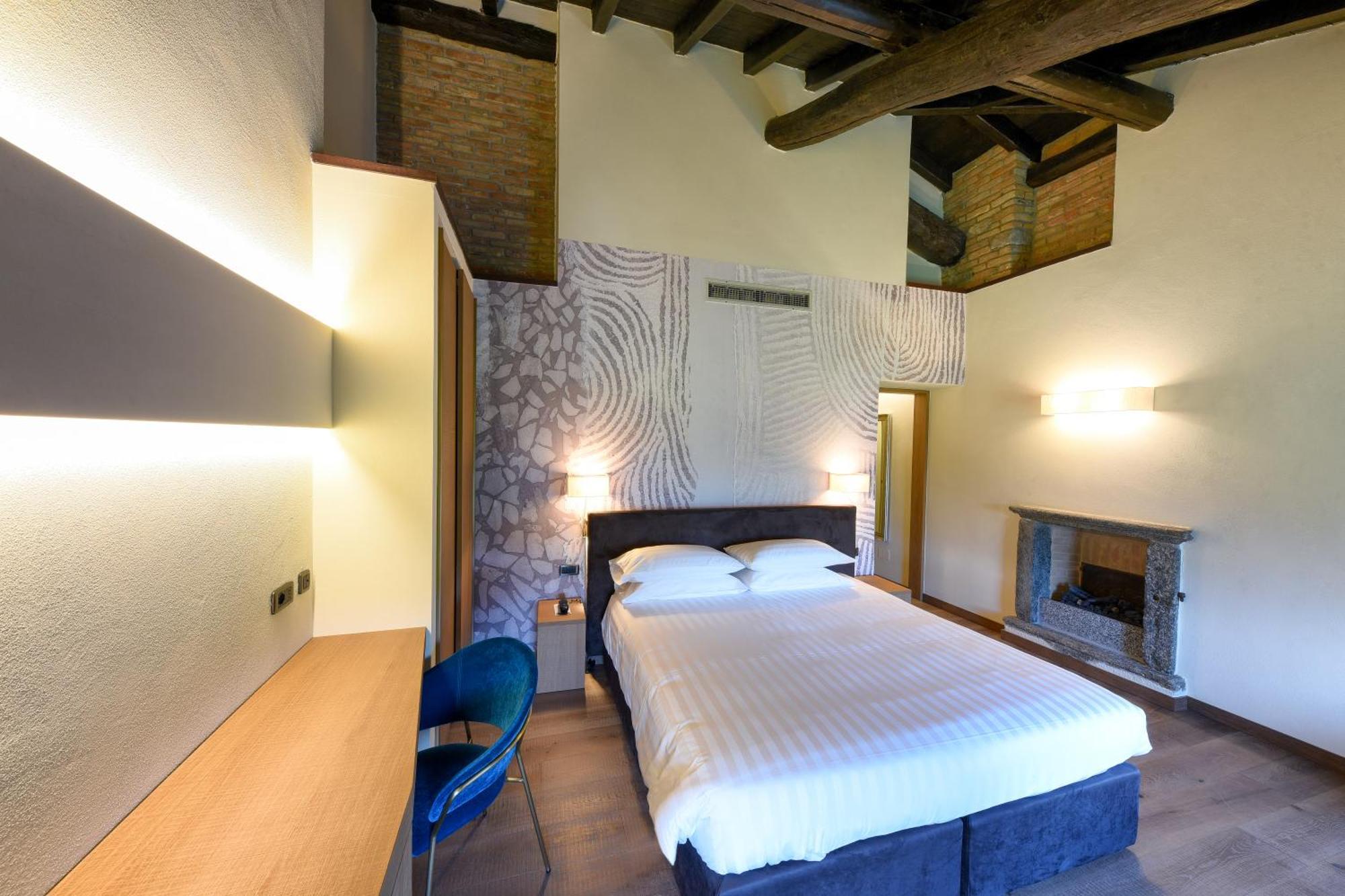 Relais & Spa Castello Di Casiglio Έρμπα Δωμάτιο φωτογραφία